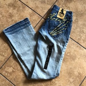 Boot cut jeans with bedazzled back pocket